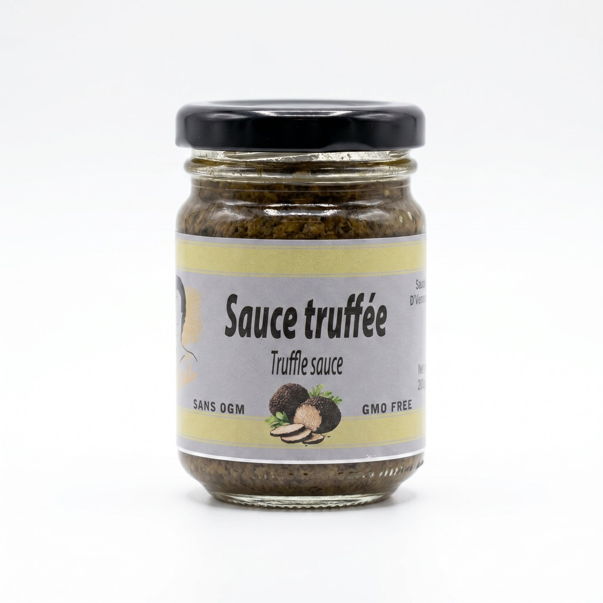 Pot de sauce truffée Orgasta, pâte/jus brun translucide avec bouchon noir et étiquette grise et jaune indiquant “Sauce truffée” et image de truffes.